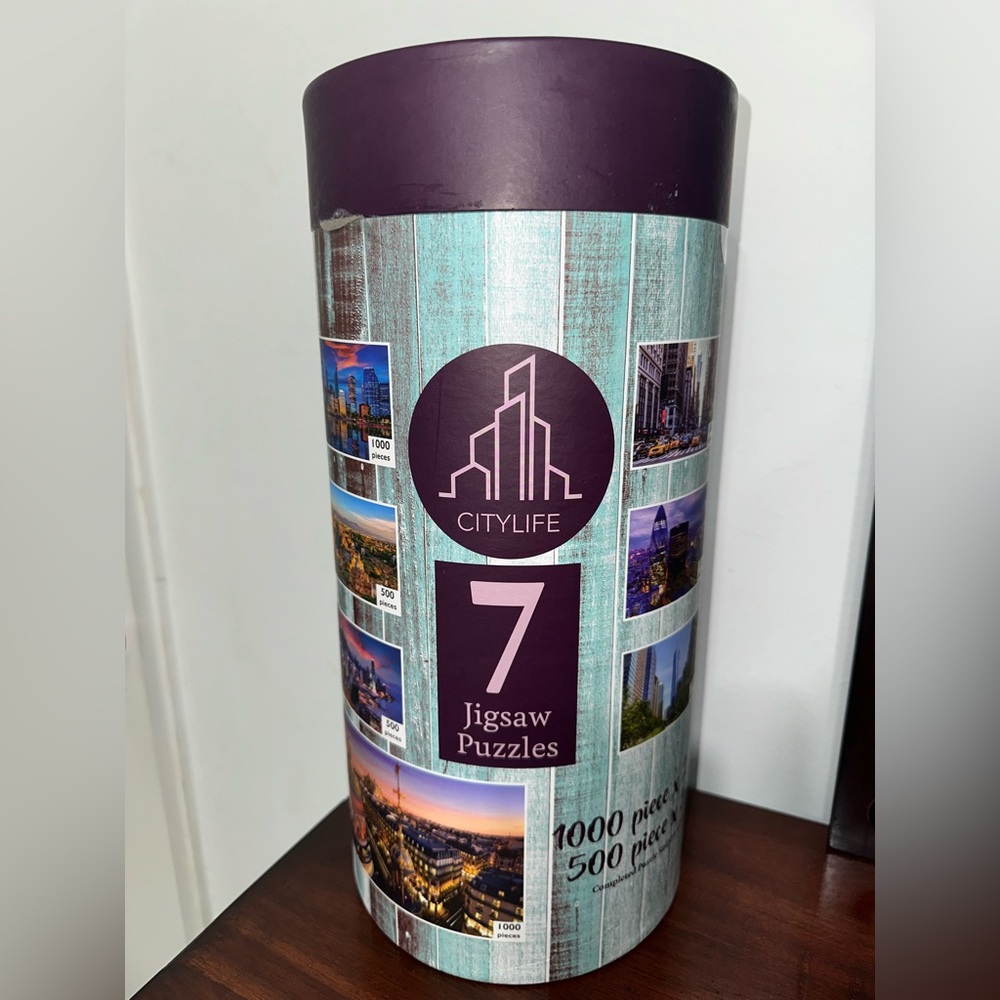 Puzzles 7 in 1 Multi Pack Tube Citylife 2 - 1000pc & 5 - 500pc Robert Fredrick